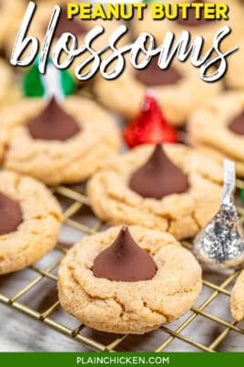 peanut butter cookies topped with a hershey kiss on a cooling rack with text overlay