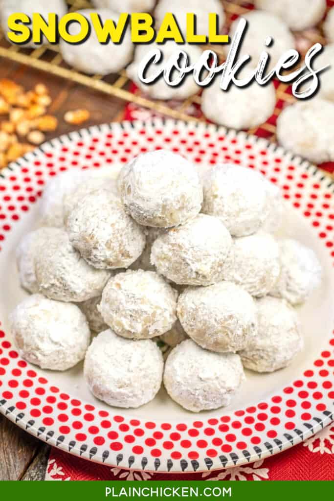plate of snowball cookies on a table with a red snowflake towel with text overlay