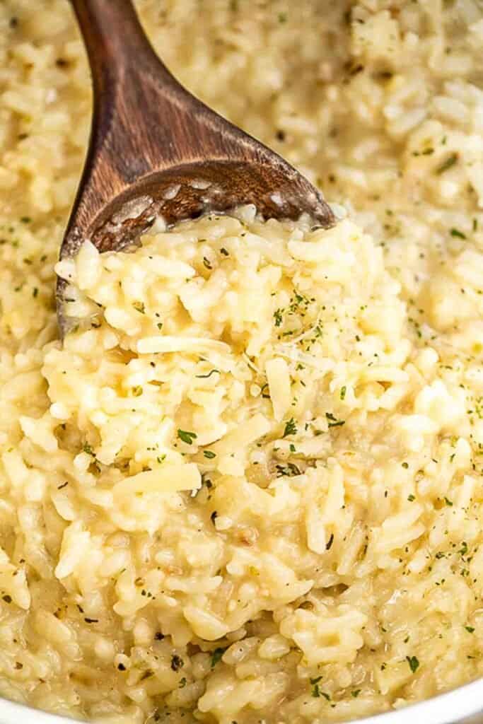 scooping risotto from instant pot
