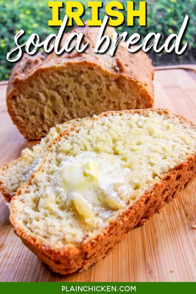 loaf of irish soda bread sliced and smeared with butter
