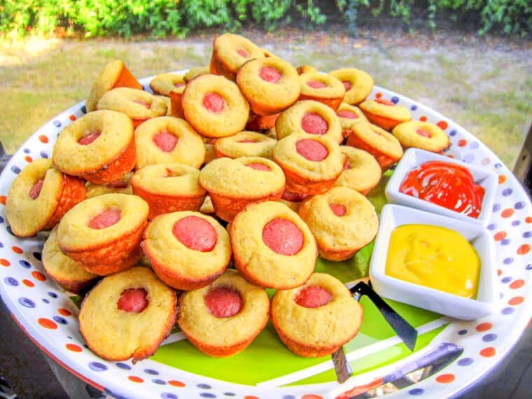 platter of corndog muffins with ketchup and mustard