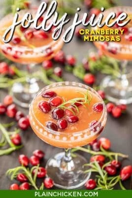 glasses of cranberry mimosas with rosemary garnish