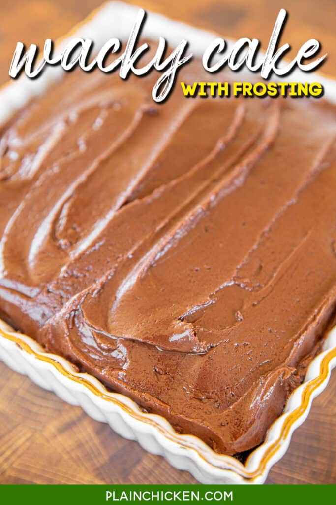 frosted chocolate cake in a cake pan