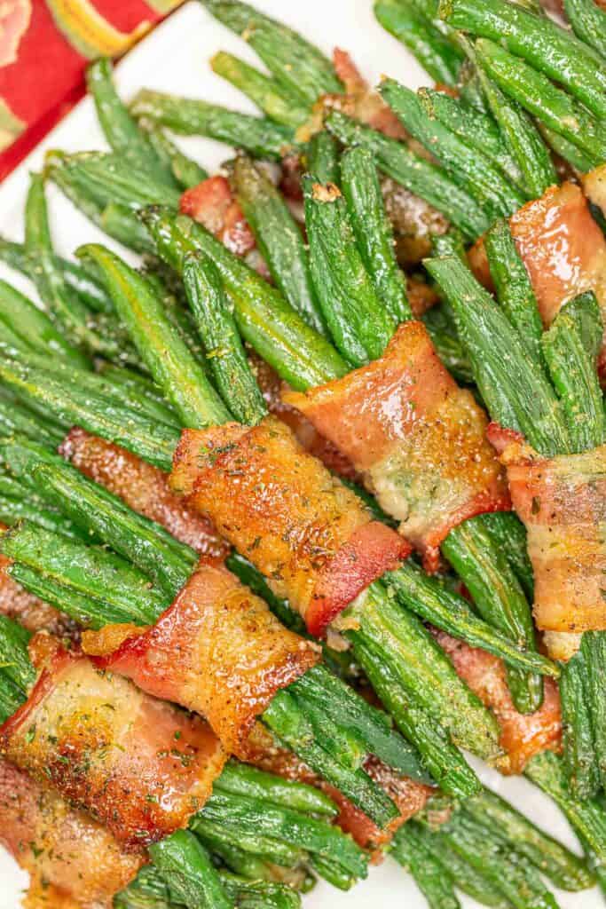 bacon wrapped green beans on a platter