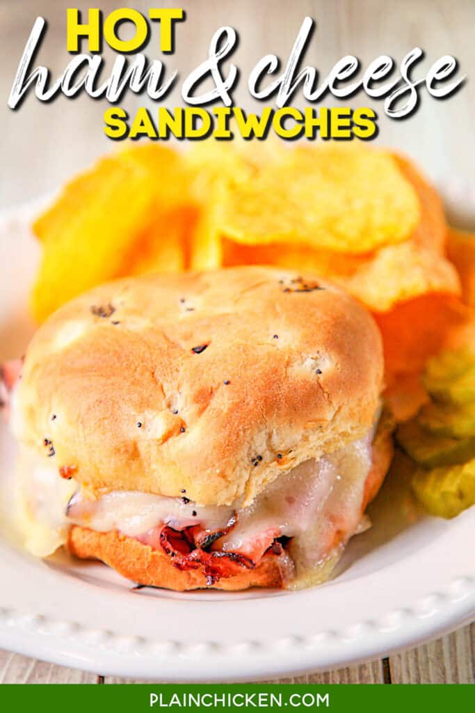 baked ham & cheese sandwich on a plate with chips
