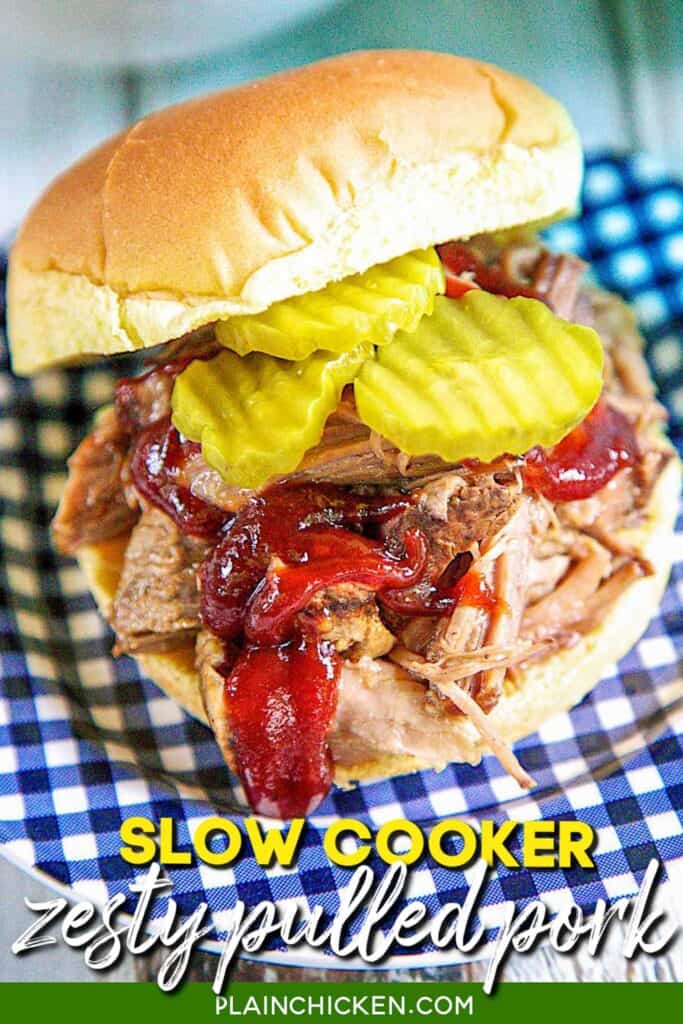 pulled pork sandwich topped with bbq sauce and pickles on a plate with text overlay