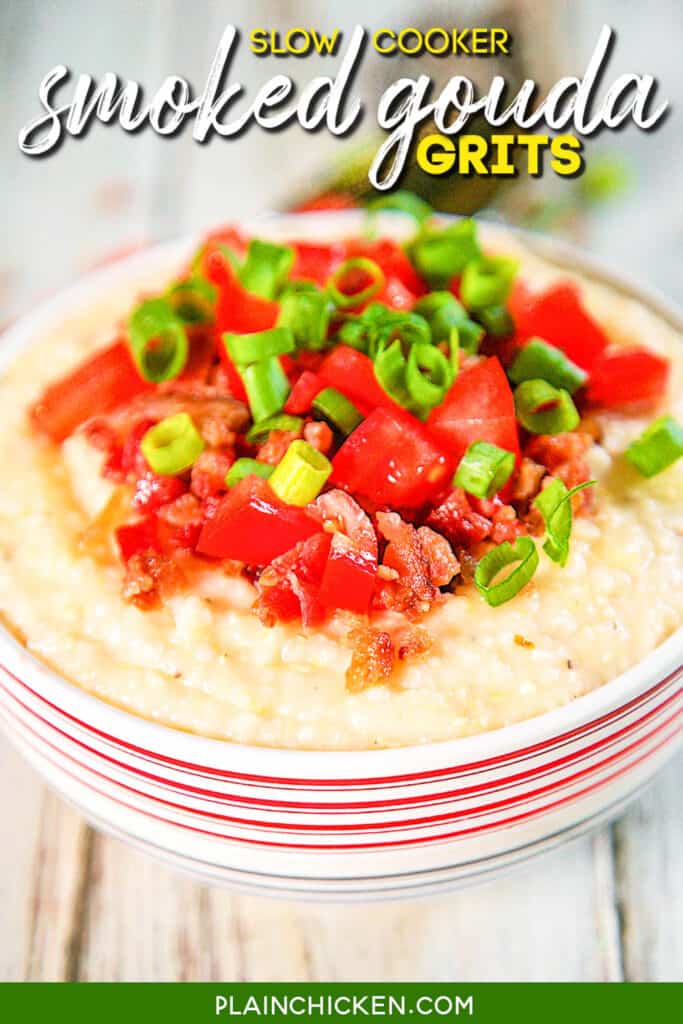 bowl of grits topped with bacon, tomatoes and green onions