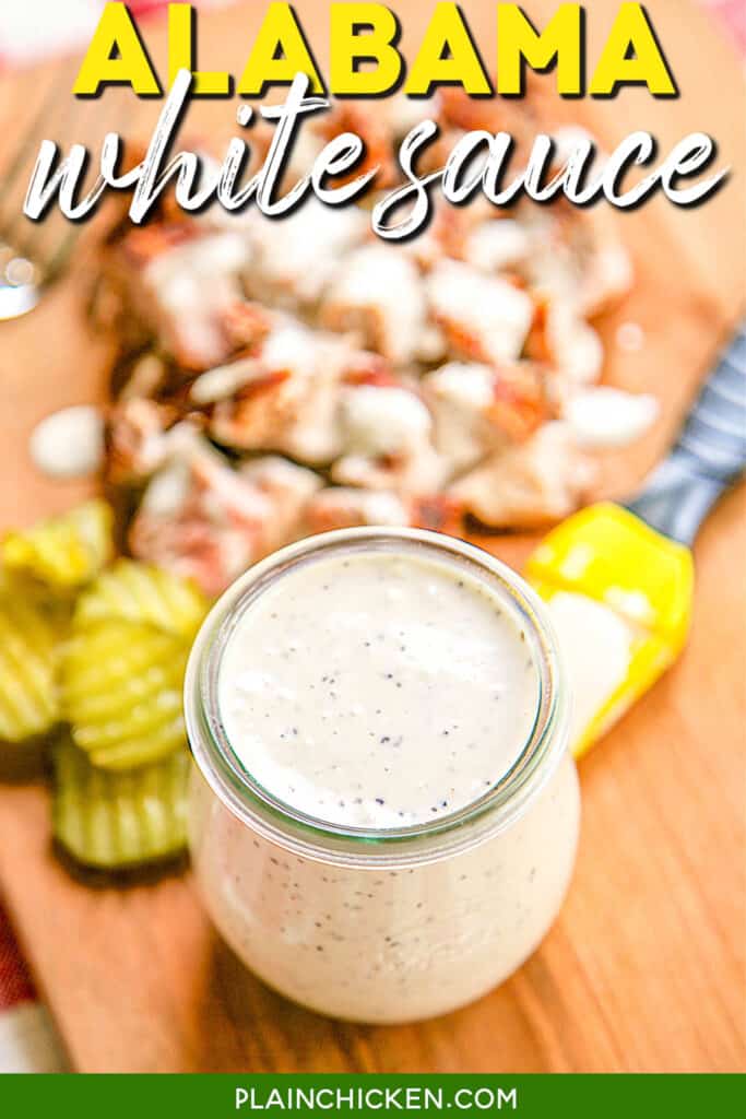 jar of white bbq sauce on a cutting board with text overlay