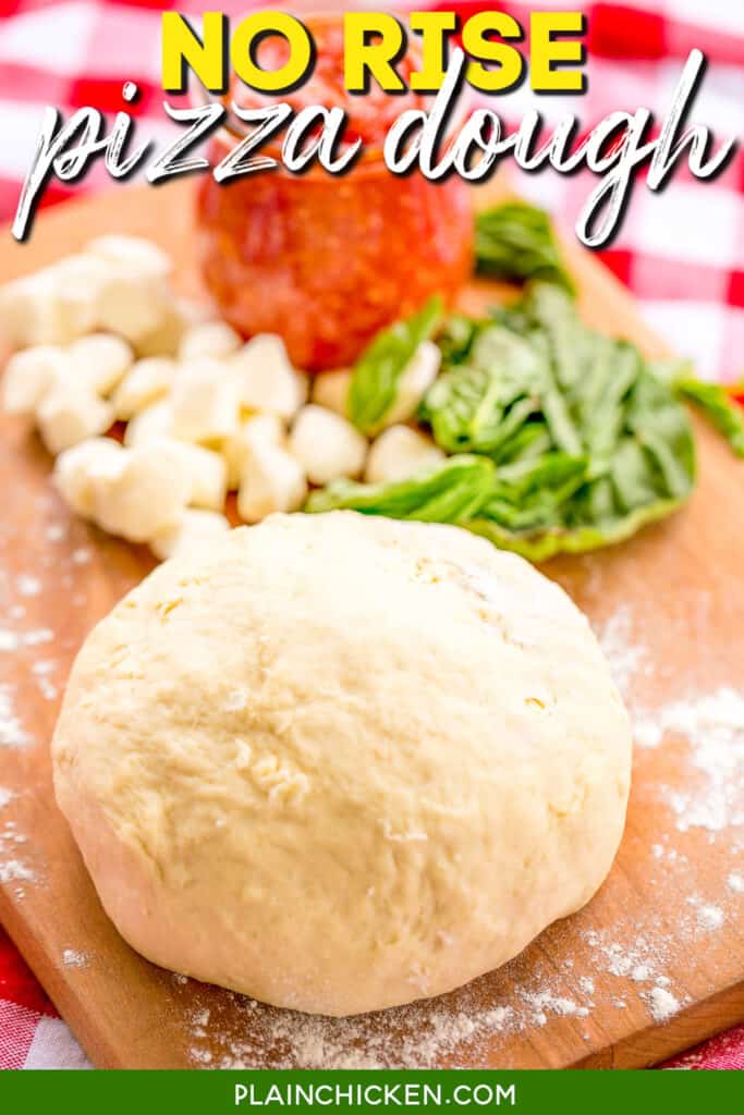 ball of pizza dough on a board