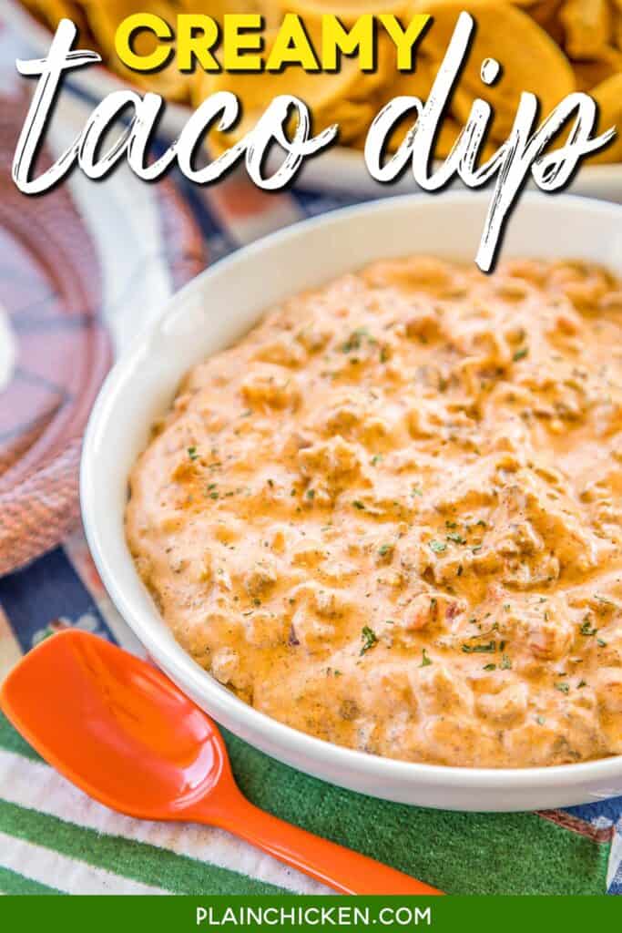 bowl of taco dip with chips with text overlay