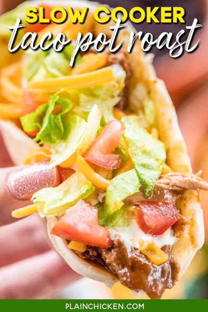 holding a taco with text overlay