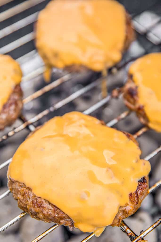 cheeseburgers on the grill