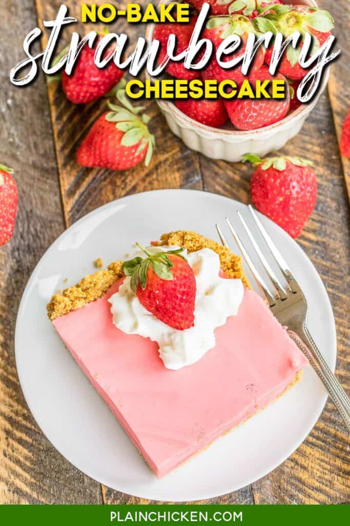 slice of strawberry cheesecake topped with whipped cream and strawberries