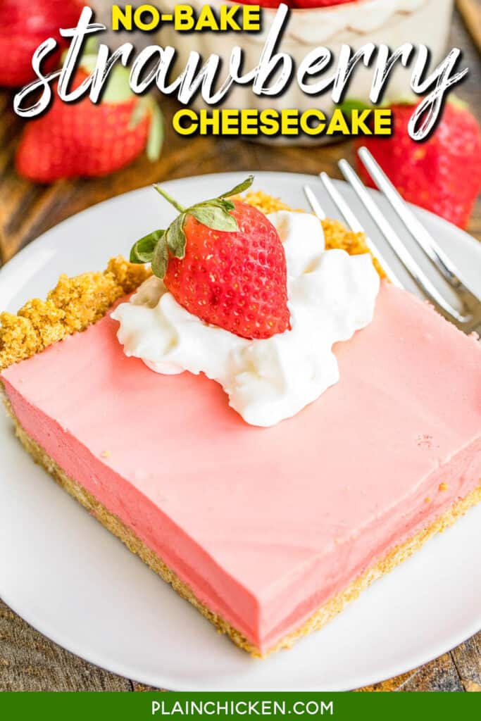 slice of strawberry cheesecake topped with whipped cream and strawberries