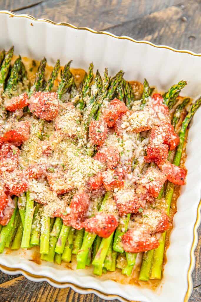 baking dish of asparagus and tomatoes