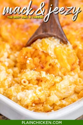 scooping macaroni and cheese from baking dish