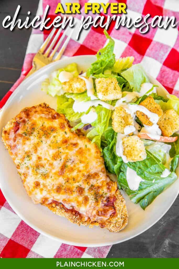 chicken parmesan and salad on a plate