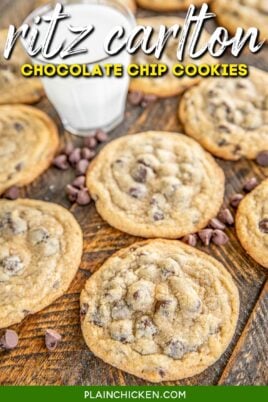 chocolate chip cookies on a board with milk