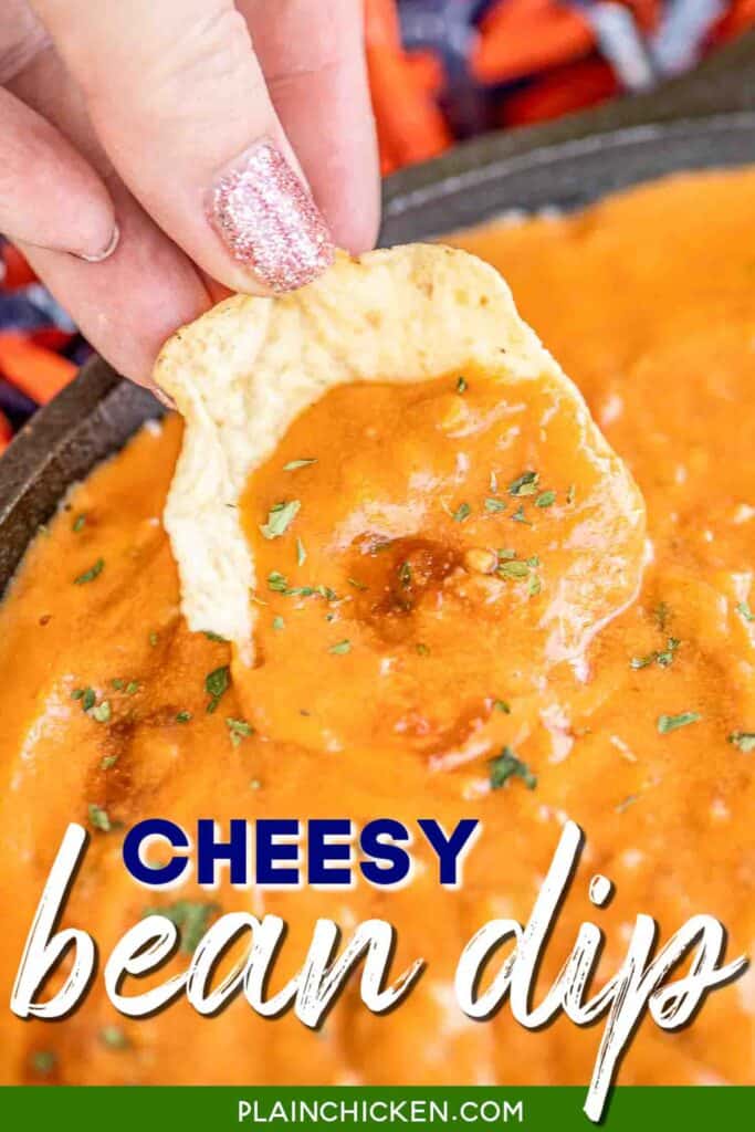 dipping chip in cheese dip