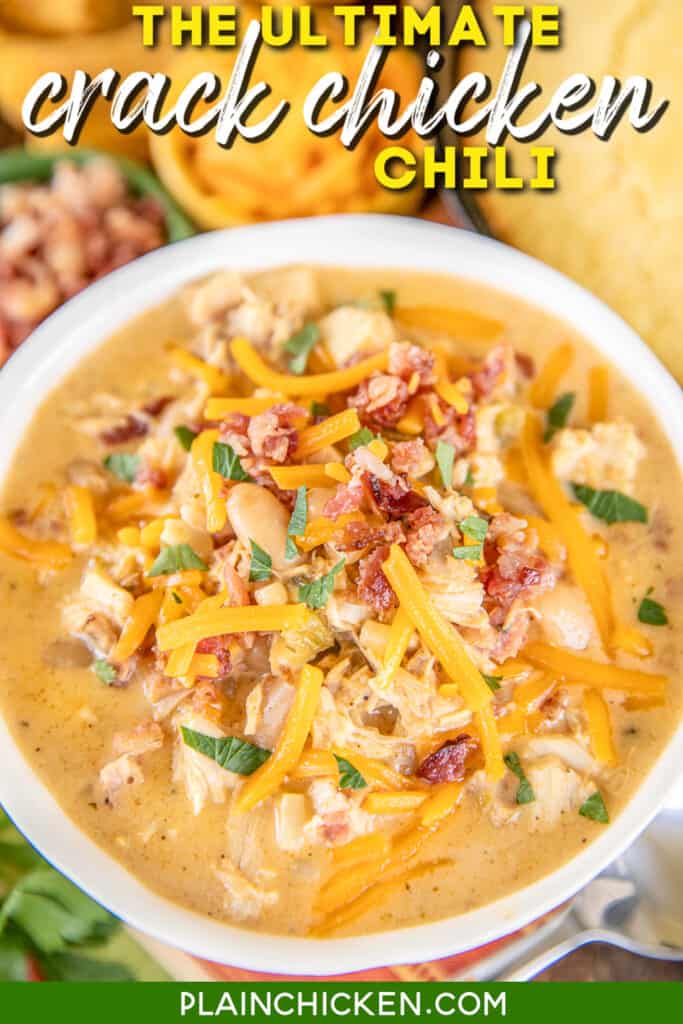 bowl of chicken chili with cheese and bacon