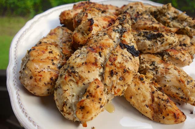 plate full of grilled chicken