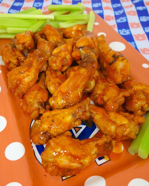 Dirty Steve's Famous Wings - seriously THE BEST wing sauce EVER!! We like to bake the chicken wings and toss in the sauce. You can fry the wings if you prefer. Make the sauce now and refrigerate up to 2 months! SO good!!! Perfect amount of heat! #wings #tailgating #hotsauce