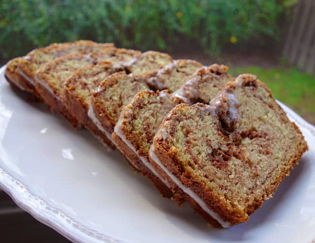 Cinnamon Swirl Quick Bread - seriously delicious! SO easy and SOOO good! Flour, sugar, baking soda, buttermilk, vanilla, egg, oil, cinnamon, powdered sugar and milk. This bread is great for breakfast or dessert. Makes a great homemade gift too!! I have zero self-control around this yummy cinnamon bread!!! #bread #cinnamon #quickbread #breakfast