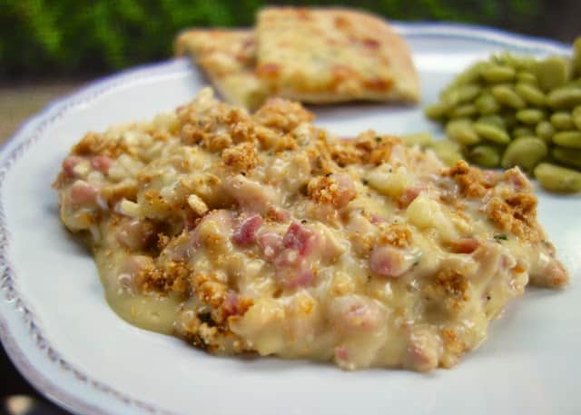 Chicken Cordon Bleu Casserole - seriously delicious!! Packed full of chicken, ham and CHEESE!!! This is super easy to make. Can make it ahead of time and refrigerate or freezer for later. Chicken, ham, swiss cheese, cream of chicken soup, sour cream, milk, dijon mustard, cracker crumbs. Serve with some green beans and rolls. Everyone cleaned their plate! GREAT family friendly casserole! #casserole #chickencasserole #weeknightmeal #familyfriendlymeal