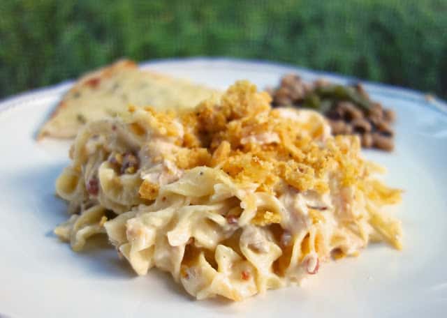 Cracked Out Chicken Noodle Casserole Recipe - chicken, noodles, chicken soup, cheddar, bacon, Ranch and sour cream, topped with crushed Fritos. THE BEST chicken casserole. We eat this at least once a month. Everyone loves it!