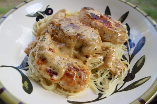 Chicken Lazone - ready in 15 minutes - no prep required! We made this 3 days in a row! Chicken seasoned with salt, chili powder, onion powder, garlic powder and cayenne then simmered in butter and heavy cream. Seriously THE BEST!!! #chicken #easydinnerrecipe