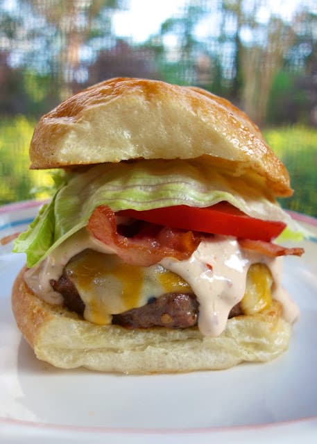 Chipotle Ranch Burgers - hamburger meat, Ranch and pureed chipotles - grill or pan cook the burgers, top with a yummy Chipotle Ranch sauce, bacon, lettuce and tomatoes. SOOOOO good. It has a kick, but we all loved this!