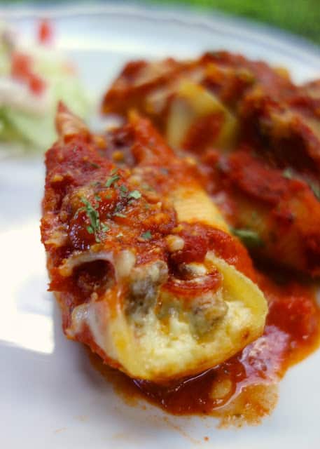 Pizza Stuffed Shells - jumbo pasta shells stuffed with cheese, sausage and pepperoni ,topped with spaghetti sauce and mozzarella - SO good! Kids and adults gobble this up!! Can make ahead of time and freeze for later.