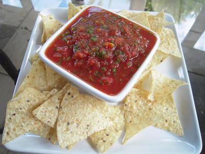 Quick Homemade Salsa - only 5 ingredients! Tastes better than the Mexican Restaurant! We always have a batch in the fridge for a quick snack.