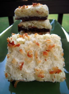 Black-Bottom Coconut Bars - homemade brownie base topped with sweet coconut topping. Reminded us of a mounds bar! SO good!! Butter, sugar, eggs, cocoa powder, flour, vanilla and coconut. Great for a potluck! #dessertrecipe #coconut #dessert