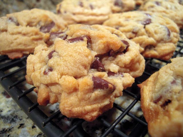 Bisquick Chocolate Chip Cookies - the last chocolate chip cookie recipe you will ever need!! Seriously DELICIOUS!!! Bisquick, brown sugar, vanilla, egg, butter, chocolate chips and nuts. These are the MOST requested cookie I make. SO good! #bisquick #chocolatechipcookie #cookierecipe