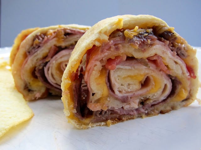 Baked Club Pinwheels - turkey, ham, roast beef, bacon and cheese baked in refrigerated french bread dough. Super easy! Great for lunch, dinner or football parties!