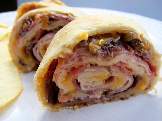 Baked Club Pinwheels - turkey, ham, roast beef, bacon and cheese baked in refrigerated french bread dough. Super easy! Great for lunch, dinner or football parties!
