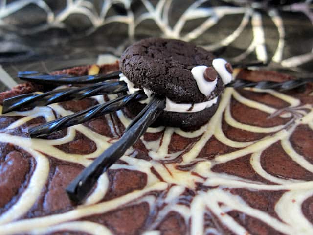 Spiderweb Brownies - transform boxed brownie mix into a super cute Halloween treat!! A quick homemade cheesecake mixture makes the spider web. Makes 2 brownies. SO fun!!! #Halloween #brownies #kidfriendly