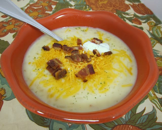 Slow Cooker Potato Soup - I finally found a good potato soup recipe! Frozen hash browns, chicken broth, cream of chicken soup, onion, and cream cheese. This soup is SO easy and SOOO good! Everyone always asks for the recipe.