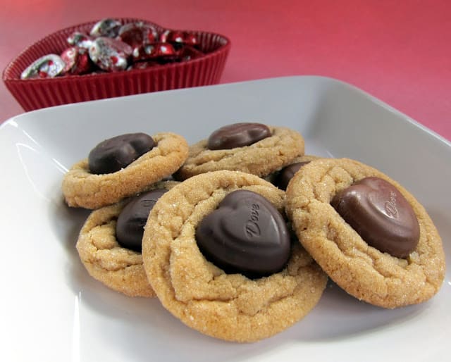 Biscoff Heart Cookies - Biscoff cookies topped with Dove chocolates. Perfect for Valentine's Day!