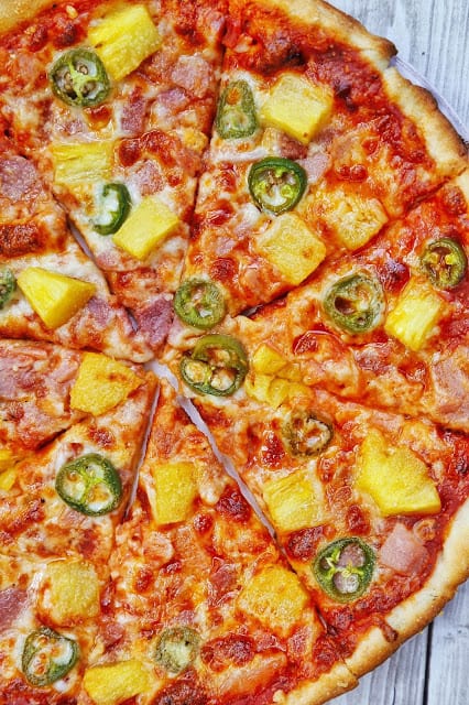 Spicy Hawaiian Pizza - quick homemade pizza that tastes better than any pizza restaurant! Use leftover holiday ham! Everyone loved this flavor combination! Gets a kick from the jalapeños.