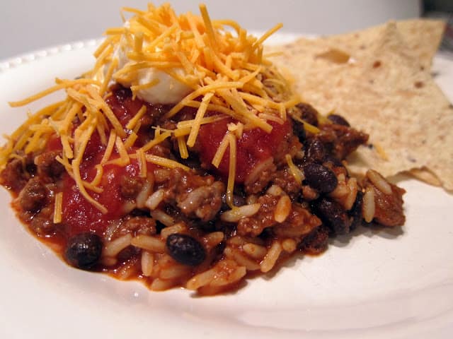 Taco Rice - one pot dish - taco meat, black beans, tomato sauce and rice tossed together - top with favorite taco toppings - fun change to taco night!