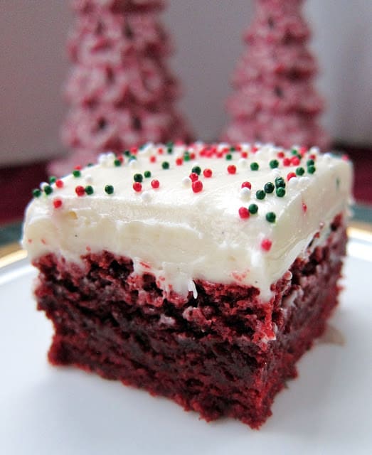 Red Velvet Brownies - quick homemade red velvet brownies topped with a homemade cream cheese frosting. These brownies are AMAZING! SO easy to make and even easier to eat! Make a great gift at the holidays too!