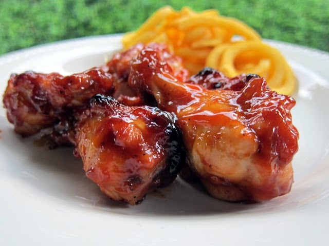 Brown Sugar BBQ Wings - chicken wings tossed in a quick homemade BBQ sauce and baked. Chicken drumettes, ketchup, brown sugar, worcestershire, mustard and cider vinegar. Can make sauce ahead of time. These things are SO good! Great for tailgates and parties. There are never any leftovers!