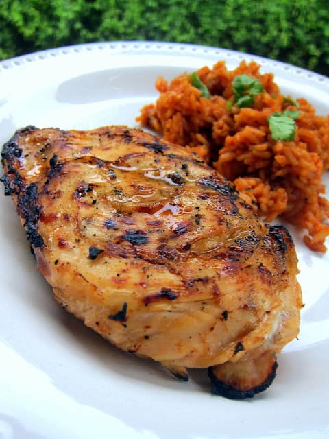 Spicy Margarita Chicken Recipe - tequila, trip sec, lime juice, chili powder, garlic, cumin and a fresh jalapeño - tastes like a margarita with a kick! Great with some quick Mexican rice or as fajitas.