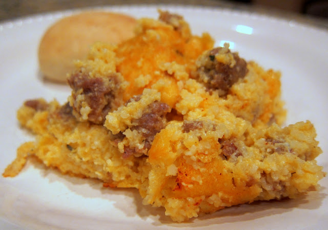 Sausage & Cheese Grits Casserole - so simple and tastes amazing!!! Great for breakfast, lunch or dinner! Sausage, water, grits, cheddar cheese, milk, thyme, garlic, eggs and paprika. Can make ahead and refrigerate overnight. Makes enough for a crowd. Easy to half. YUM! #grits #casserole #breakfast #sausage