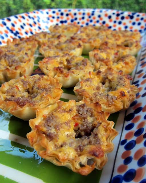 Spicy Sausage and Cheese Tarts - only 4 ingredients! Can make ahead of time and freeze for a quick snack later. People go crazy over these tarts! I always have a batch in the freezer! SO good!