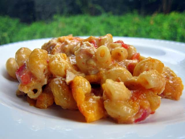 King Ranch Mac and Cheese Recipe- best dish ever! Pasta, chicken, chicken soup, sour cream, Velveeta, cheddar and Rotel - so addictive! He asked me to make it again, twice, while we were still eating it!