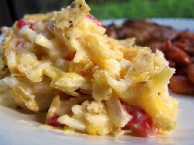 Southwestern Potato Casserole Recipe - creamy potato casserole with Rotel and topped with tortilla chips. Great casserole to freeze!
