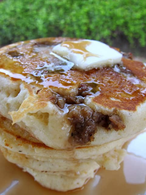Sausage Pancakes Recipe - homemade pancakes with sausage crumbles baked inside - top with butter and syrup for a delicious breakfast. Tastes like a Sausage McGriddle!